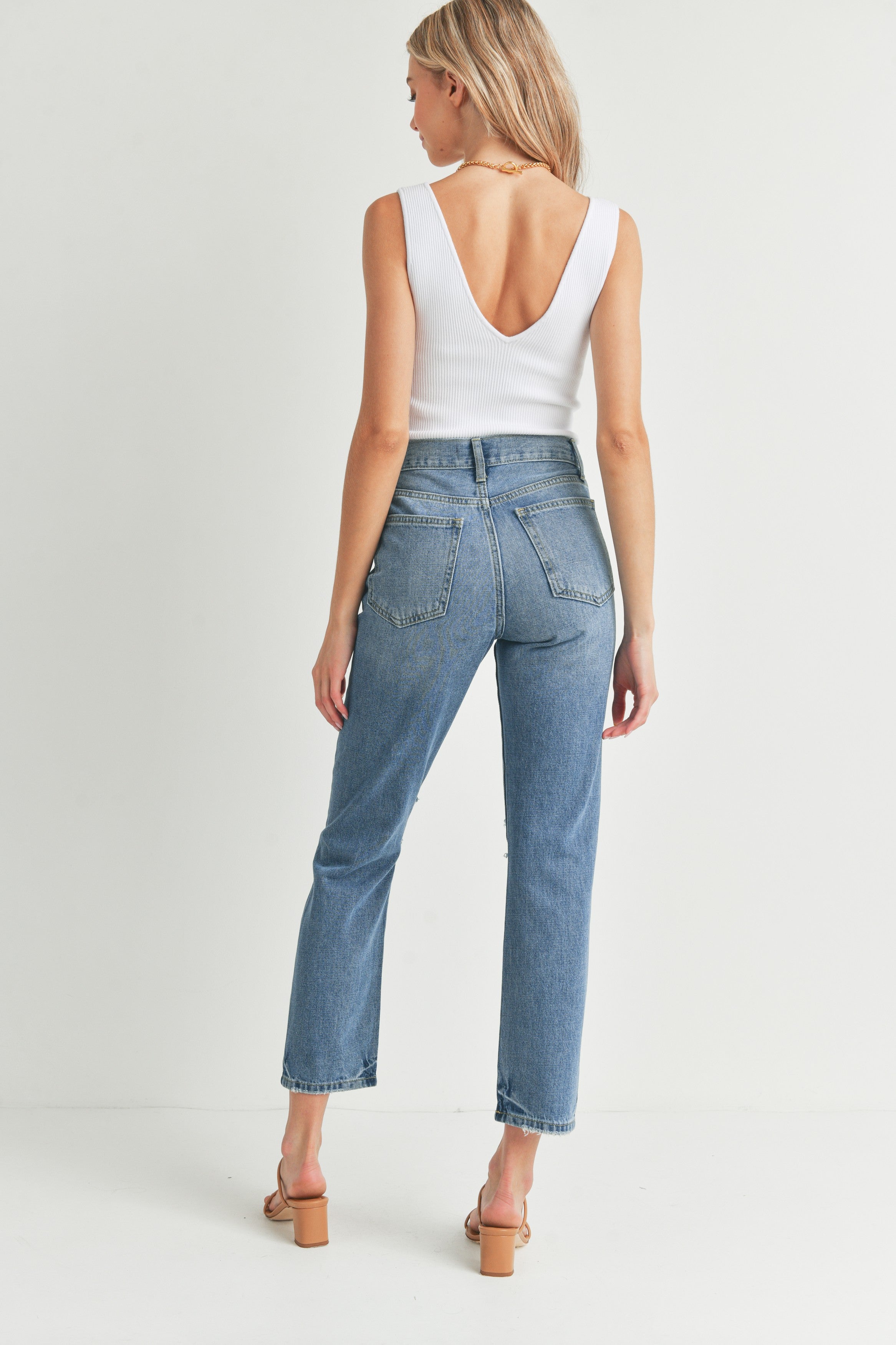The Avery High Waist Distressed Straight Leg Jeans