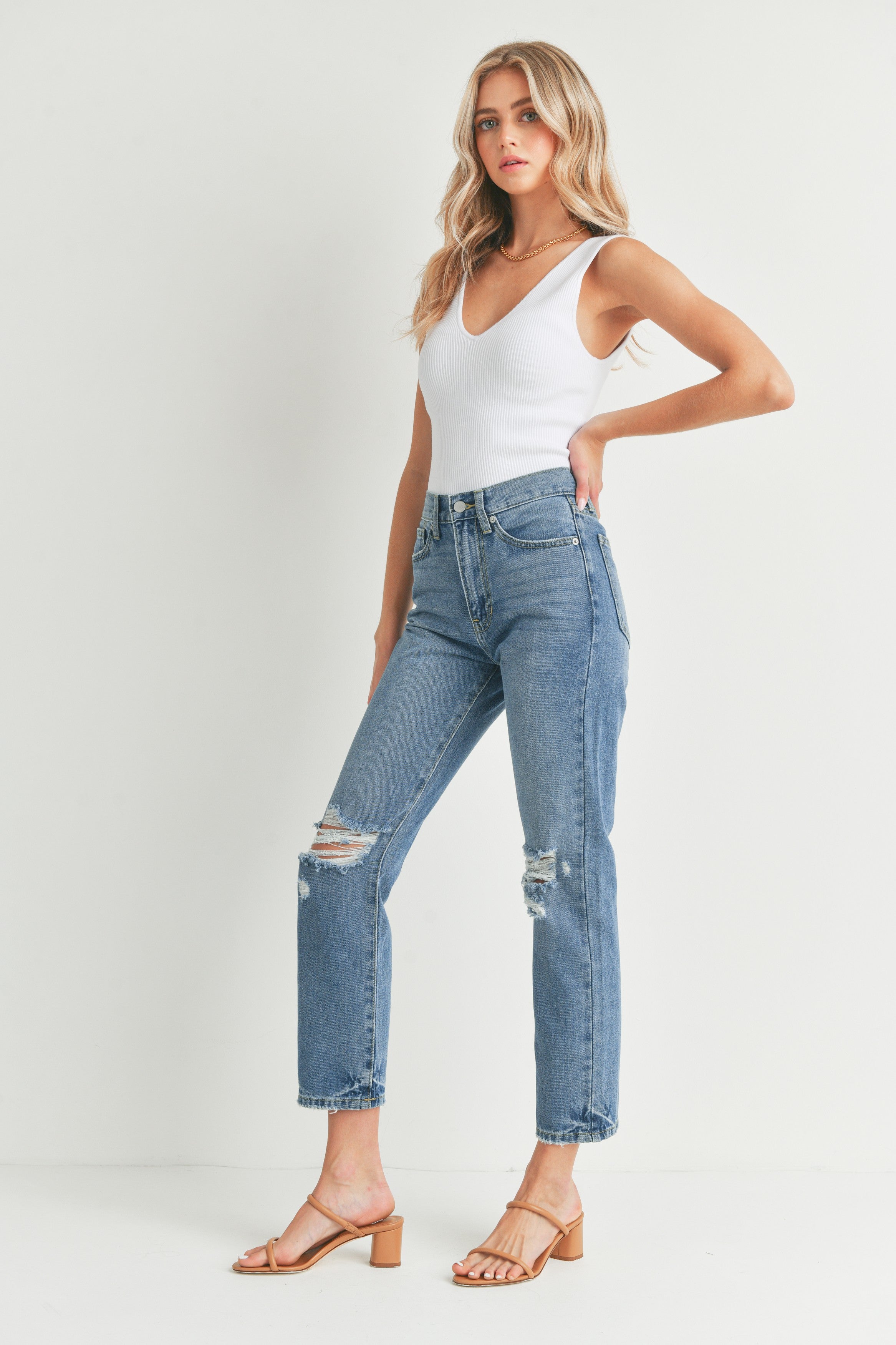 The Avery High Waist Distressed Straight Leg Jeans